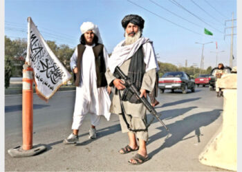 A Talibani terrorist standing outside the Interior Ministry in Kabul, Afghanistan, August 16, 2021