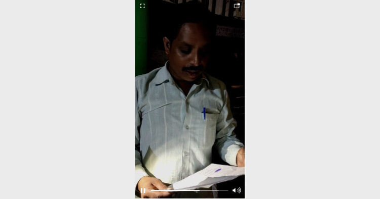 Christian Activist Mahendra Sahoo reading the bond that he will never come to the area in future in front of villagers