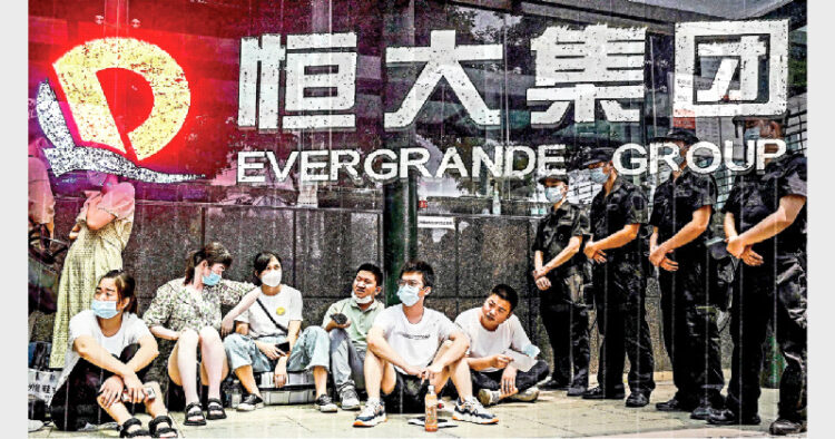 Investors gather at Evergrande's headquarters in Shenzhen to demand their money