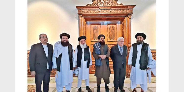Taliban leader Mullah Baradar with UN under-secy-general for humanitarian affairs Martin Griffiths at the Foreign Ministry, in Kabul