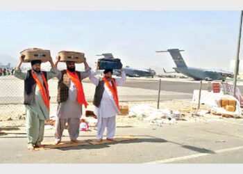 The devastating image of Afghan Sikhs leaving their country for India with three Saroops (holy copies) of Sri Guru Granth Sahib