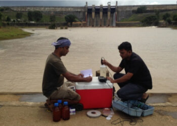Researchers collecting water samples