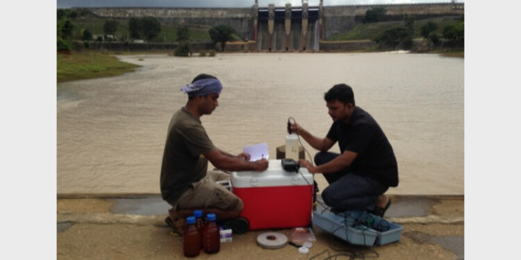 Researchers collecting water samples