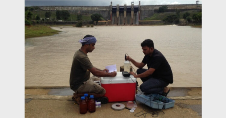 Researchers collecting water samples