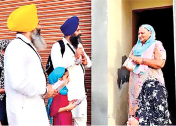 SGPC preachers distributing Sikh literature at Sultanwind village in Amritsar district of Punjab