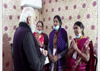 PM Modi interacting with schemes beneficiaries in Varanasi (Photo Credit: ANI)