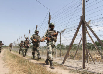 BSF patrol ahead of fence between International Border (IB) and fence (Photo Credit: Tribune India)