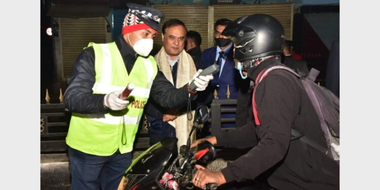 Police conducting a breath analyser test in the presence of CM Himanta Biswa Sarma (File)