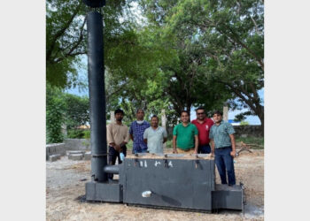 IIT Guwahati researchers with novel improved natural draft charcoal retort (Photo Credit: India Science Wire)