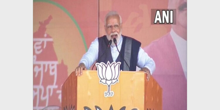 PM Modi addressing in a rally in Pathankot (Photo Credit: ANI)