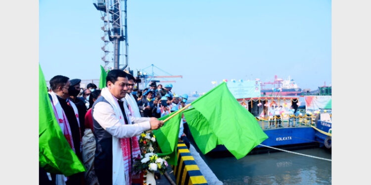 Union Minister Sonowal flagging off the maiden voyage of steel cargo laden barge from Syama Prasad Mookerjee Port in Kolkata