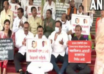 Maharashtra BJP MLAs protesting outside Maharashtra Assembly demanding the resignation of state minister Nawab Malik (Photo Credit: ANI)