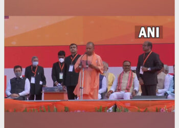 Yogi Adityanath taking oath as UP CM (Photo Source: ANI)