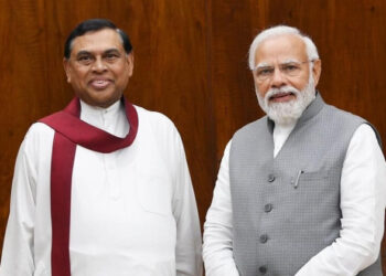 Sri Lankan Finance Minister Basil Rajapaksa with Indian PM Narendra Modi (Photo Credit: Swarajya)