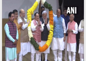 PM Modi and BJP national president J P Nadda garlanded by party leaders at BJP parliamentary party meeting (Photo Credit: ANI)
