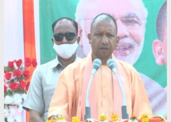 CM Yogi Adityanath addressing in a election rally in Bhadohi (Photo Credit: ANI)
