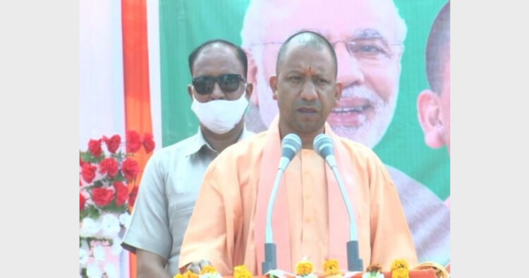 CM Yogi Adityanath addressing in a election rally in Bhadohi (Photo Credit: ANI)