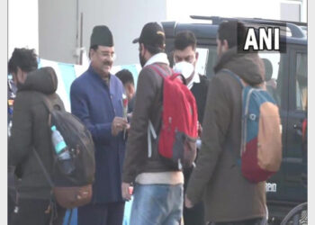 MoS Ajay Bhatt welcoming Indian nationals at Hindon airbase (Photo Credit: ANI)