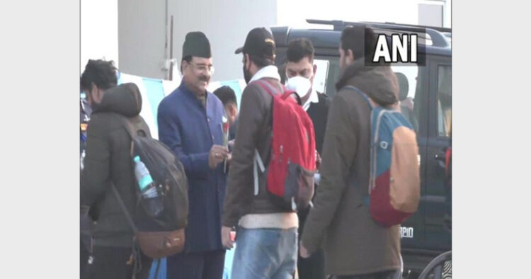 MoS Ajay Bhatt welcoming Indian nationals at Hindon airbase (Photo Credit: ANI)
