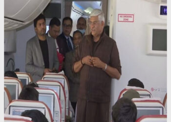 Union Minister Gajendra Singh welcoming Indian students in Air India flight (Photo Credit: ANI)