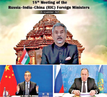 External Affairs Minister S Jaishankar, Chinese Foreign Minister Wang Yi and Russian Foreign Minister Sergei Lavrov at a RIC conference