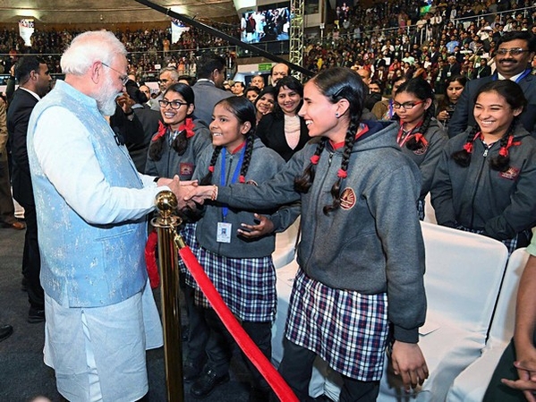 PM Modi interacting with students (Photo Source: ANI)