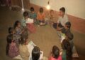 Children studying under light in Saddal (Photo Source: ANI)