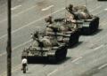 Man standing in front of tanks in Tiananmen Square (Photo Source: Getty Images)