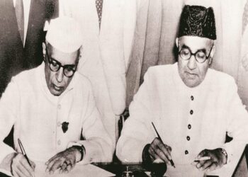 Archival Photograph of Jawaharlal Nehru and Liaquat Ali Khan Signing the Pact in 1950