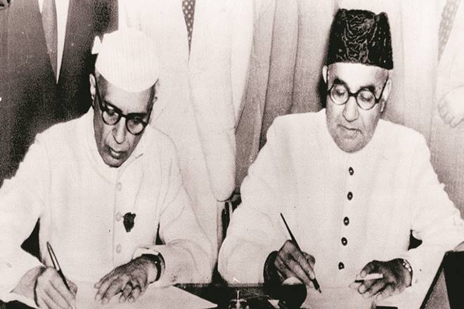 Archival Photograph of Jawaharlal Nehru and Liaquat Ali Khan Signing the Pact in 1950