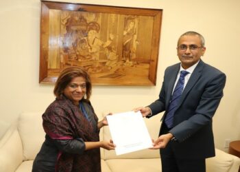 India's Deputy Permanent Representative to the United Nations, R Ravindra handing over the cheque for the UN project launched by India in 2018 (Photo Source: Twitter/@IndiaUNNewYork)