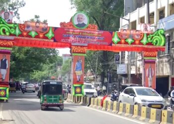 Banners and posters of Prime Minister Narendra Modi and BJP National President JP Nadda put up on a gate ahead of BJP's two-day national executive meeting on July 2-3, in Hyderabad on Friday. (ANI Photo/ ANI Pic Service)