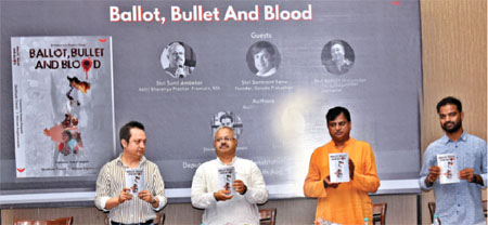 From left: Senior journalist Abhijit Majumder, RSS Akhil Bharatiya Prachar Pramukh Sunil Ambekar, founder of Garuda Prakashan Sankrant Sanu and author of the book Shivam Raghuvanshi