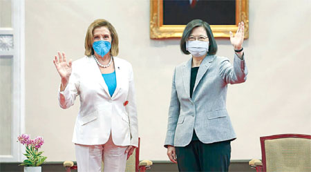 US House Speaker Nancy Pelosi, left, and Taiwanese President President Tsai Ing-wen wave during a meeting in Taipei, Taiwan