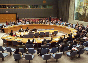 Reaffirming its unequivocal condemnation of the terrorist acts that took place in New York, Washington, D.C., and Pennsylvania on 11 September, the Security Council this evening unanimously adopted a wide-ranging, comprehensive resolution with steps and strategies to combat international terrorism. By unanimous resolution 1373(2001)the Council also established a Committee of the Council to monitor the resolution's implementation and called on all States to report on actions they had taken to that end no later than 90 days from today.
A general view of the Council as they vote unanimously in favour of resolution 1373 (2001), with one abstention from the United States.