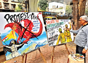 A teacher of Gurukul School of Art makes painting depicting India-China clash along the Line of Actual Control (LAC) near Tawang in Arunachal Pradesh, in Mumbai