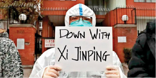 A doctor in China displaying a placard to show resentment against his President’s draconian COVID-19 policy