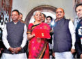 Union Finance Minister Nirmala Sitharaman, along with MOS Bhagwat Kishanrao Karad and Pankaj Chaudhary, holds up a folder with the Government of India’s logo before leaving  her office to present the  Budget in the Parliament on February 1, 2023