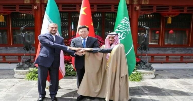 ( Iranian Foreign Minister Hossein Amir-Abdollahian , Saudi Arabia's Foreign Minister Prince Faisal bin Farhan Al Saud and Chinese Foreign Minister Qin Gang shake hands during a meeting in Beijing, China, April 6, 2023 )