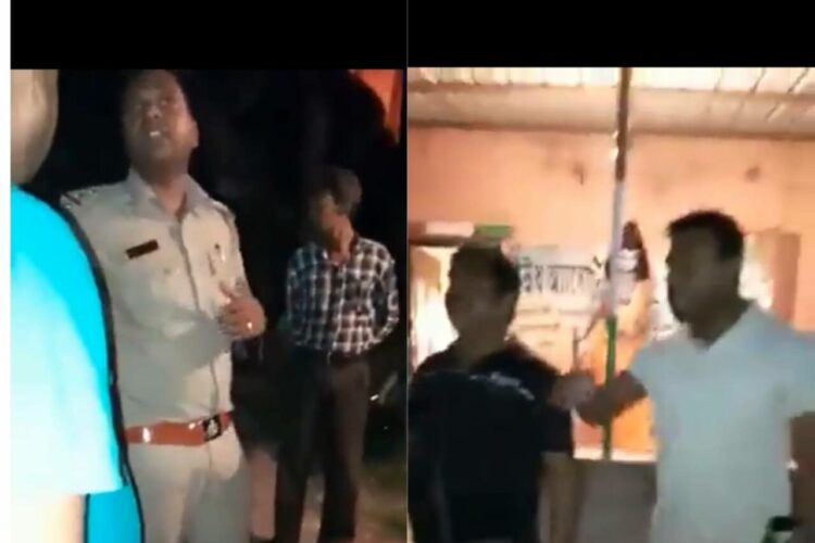 The police officer on the left and the statue of Bhagwan Ram on the right
