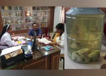 Onkar Singh and Nivedita Sharma with the principal sister Grace, Foetus recovered on the right