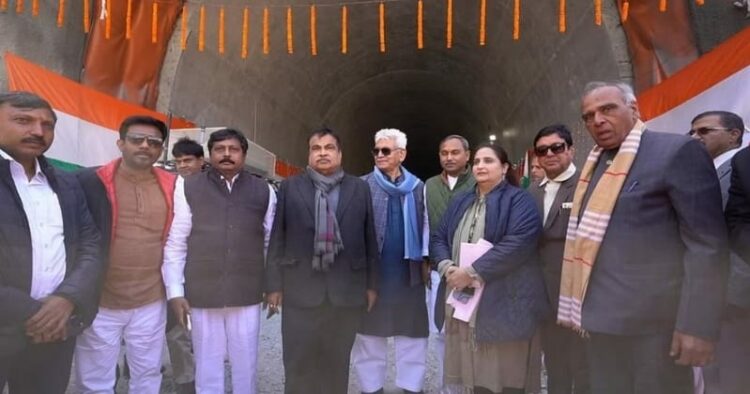 ( Union Minister for Road Transport & Highways Nitin Gadkari with J&K Lt. Governor Manoj Sinha inspects the construction work of Zojila Tunnel )