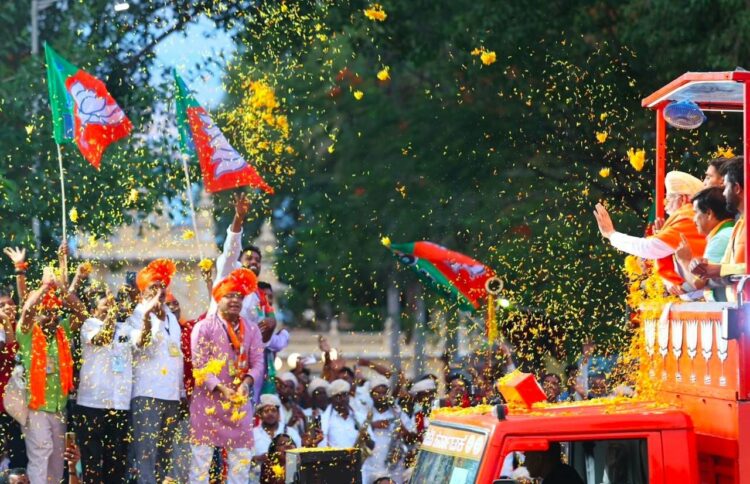 Prime Minister Narendra Modi during a roadshow at Mysuru, (Image Source: Twitter)