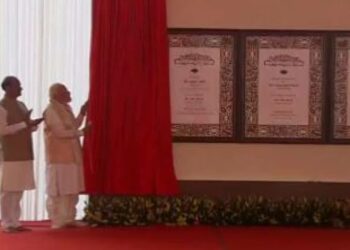 The Prime Minister Narendra Modi unveiling the plaque at the new Parliament Building on May 28: Image: Twitter