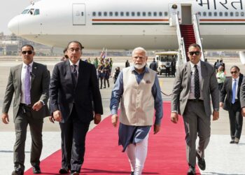 Prime Minister Narendra Modi being received by Egyptian PM Mostafa Madbouly on his arrival in Cairo, Egypt