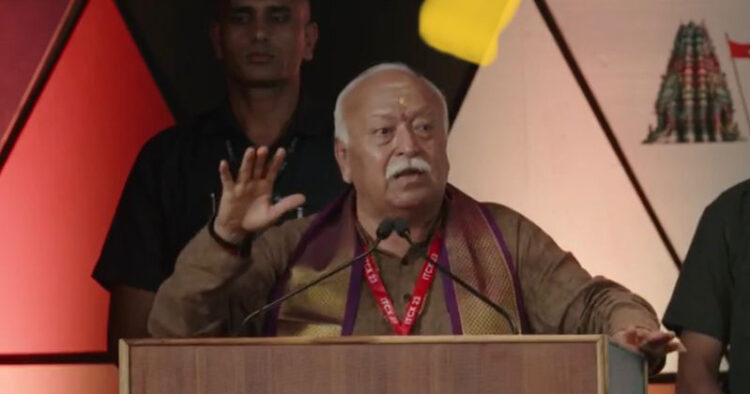 Caption: RSS Sarsanghchalak Dr Mohan Bhagwat addressing the gathering at International Temples Convention and Expo 2023, Varanasi