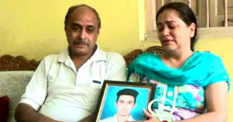 Aditya Sachdeva's parents with his photograph: Source News 18