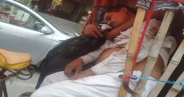 Injured Vijay Kumar Singh, General secretary of BJP unit of Jahanabad being taken to hospital on a rickshaw.