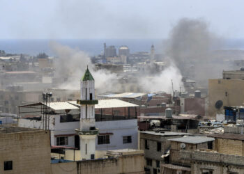 Smoke rises during a clashes that erupted between members of the Palestinian Fateh group and Islamist militants in the Palestinian refugee camp of Ein el-Hilweh near the southern port city of Sidon, Lebanon on July 30, 2023.