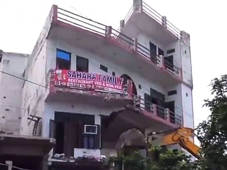 Hotel used to pelt stones in recent clashes demolished